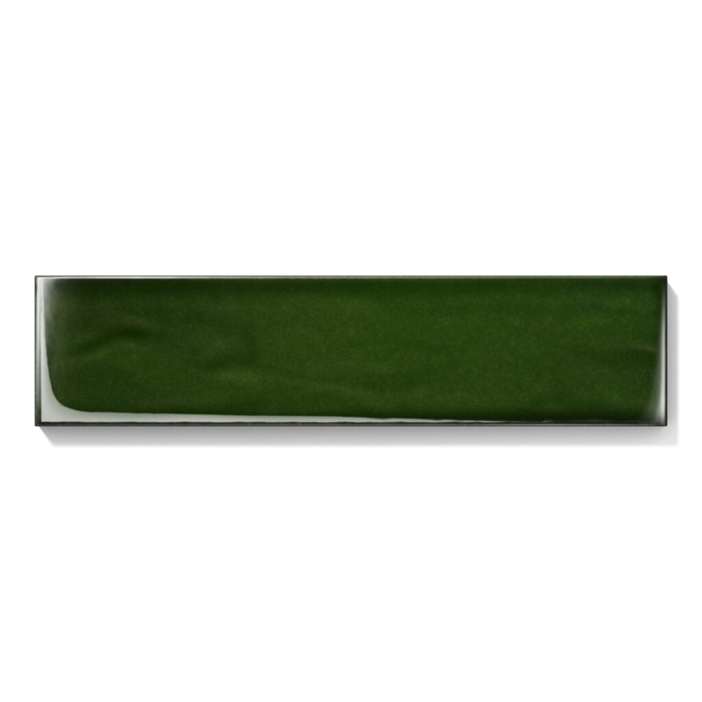 Fliese BRICK in der Farbe Flaschengrün. Das Bild zeigt eine einzelne BRICK-Fliese in einem grünen Farbton. Die Datei ist ein Foto im JPEG-Format.
